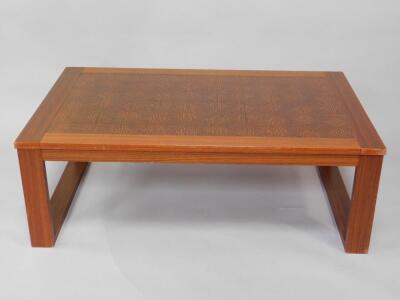 A stained pine rectangular occasional table