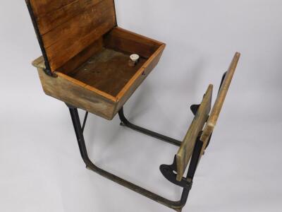 An early 20thC oak and iron framed child's school desk - 2