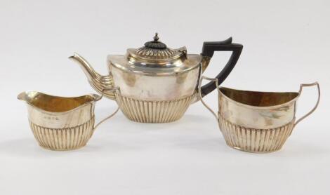 A Victorian silver semi fluted teapot