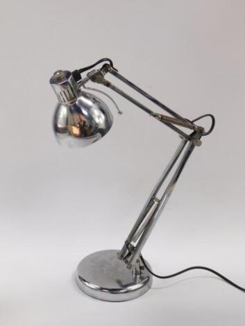 A late 20thC white metal angle form table lamp