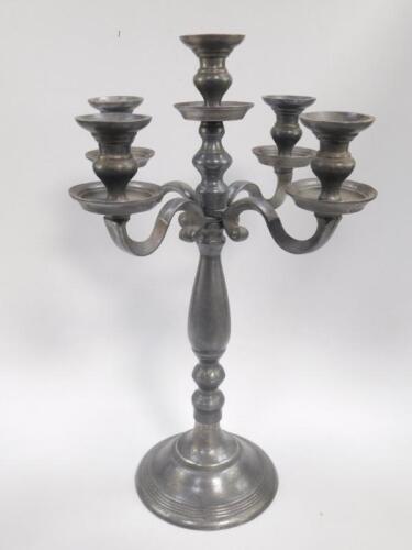 A pewter five branch candelabrum