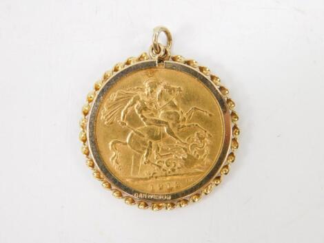 A George V gold sovereign 1913 in a 9ct gold pendant mount