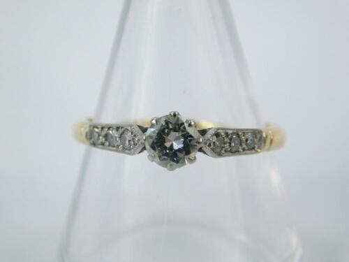 A diamond solitaire ring