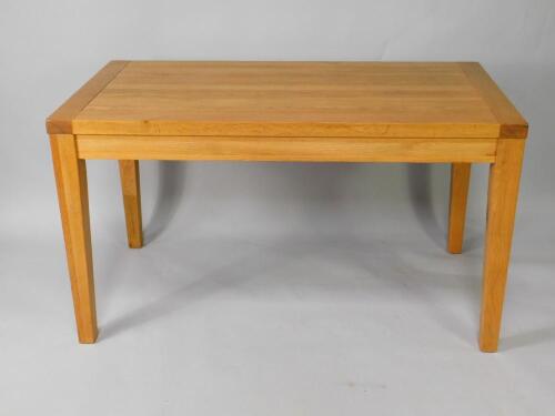 An oak rectangular kitchen table