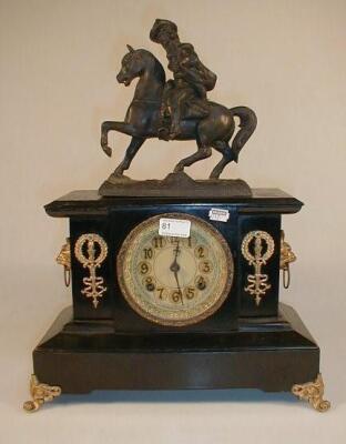 A 19thC American cast metal and gilt mounted figural mantel clock