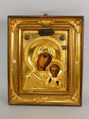 A Russian late 19thC Icon painted with The Kazanskaya Mother of God