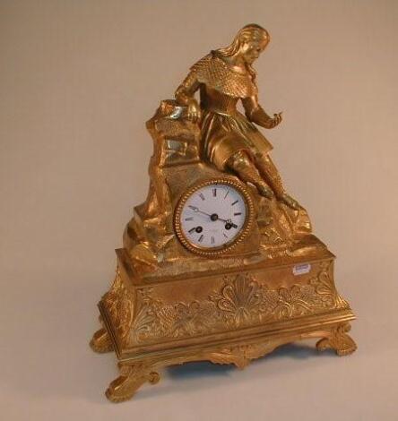 A 19thC French gilt metal mantel clock of eight-day movement striking on a bell