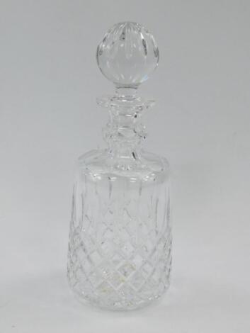 A Waterford cut glass decanter and stopper decorated in the Colleen pattern