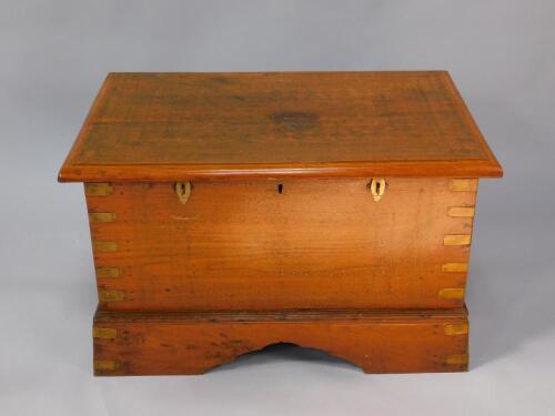 An Indian hardwood and brass inlaid and bound chest