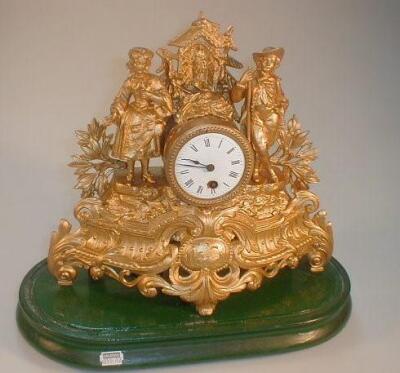 A 19thC French gilt spelter mantel clock with a timepiece movement