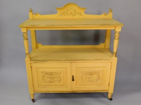 A Victorian yellow painted sideboard