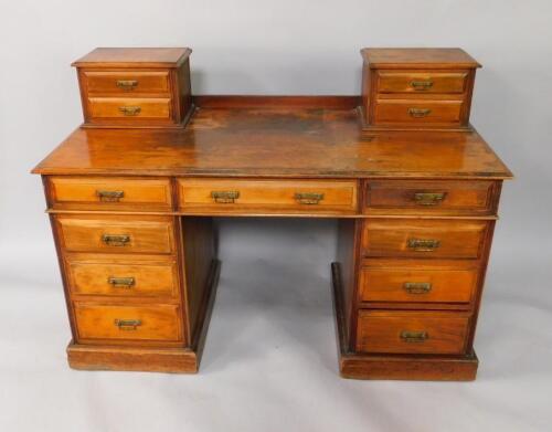 A Victorian mahogany twin pedestal desk by James Winter & Sons