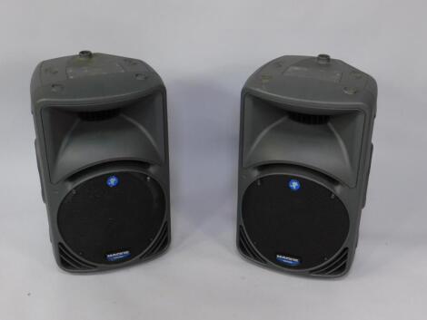 A pair of Mackie Active SRM450 powered speakers.