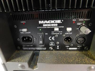 A pair of Mackie Active SRM450 powered speakers. - 2