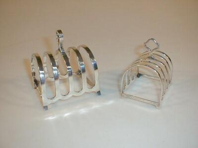 Two silver five-bar toast racks