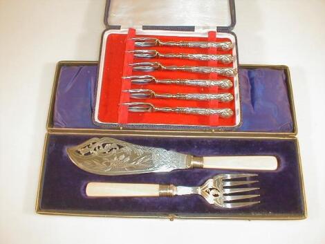 A set of six silver handled Kings pattern cake forks