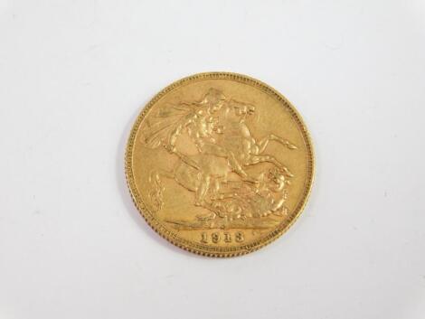 A George V gold sovereign 1913