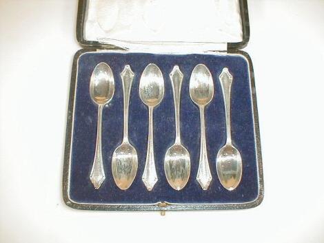 A set of six George V silver coffee spoons