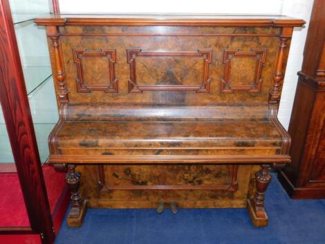 An F Stichel of Leipzig walnut cased upright piano