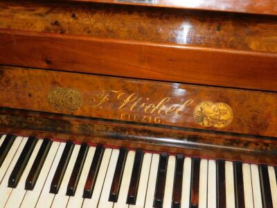 An F Stichel of Leipzig walnut cased upright piano - 4