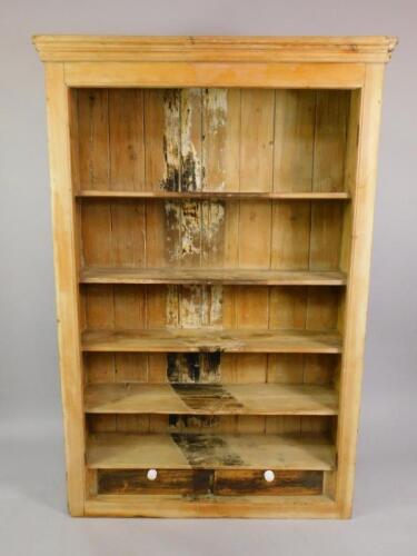 A pine open bookcase