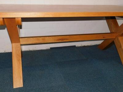 An oak refectory style dining table - 3