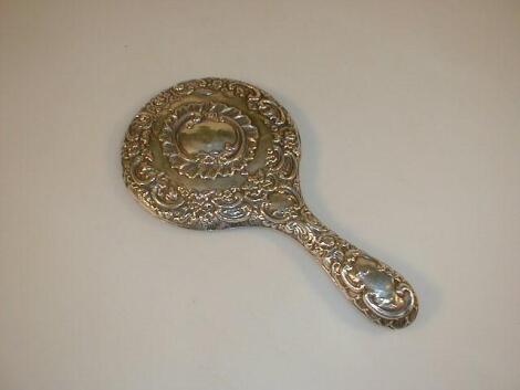 An Edward VII silver backed hand mirror