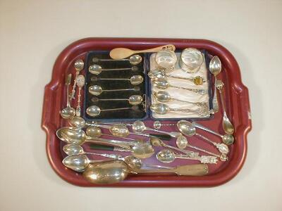 Two silver napkin rings; a continental silver spoon; a Victorian silver