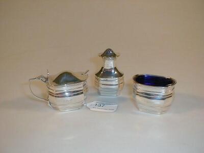 A George VI three-piece silver condiment set