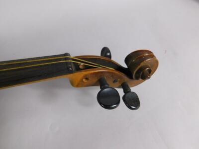 A violin in a canvas case - 2