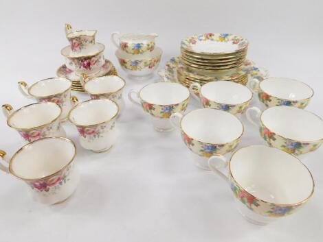 A Royal Albert porcelain part coffee service decorated in the Autumn Rose pattern