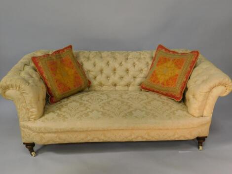 A Victorian oak framed Chesterfield sofa