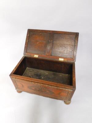 An early 20thC oak linen chest - 2