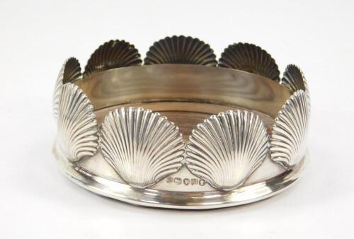 A Victorian silver wine coaster