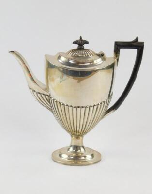 A Victorian silver semi fluted coffee pot