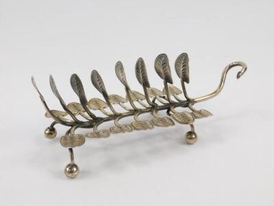 A Victorian silver six division toast rack