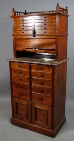 A late 19thC dentist's specimen cabinet