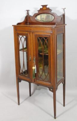 An Edwardian mahogany Sheraton revival display cabinet