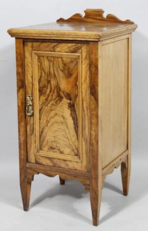 A late Victorian flame walnut pot cupboard