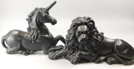 A pair of late 19th/early 20thC cast iron fire dogs