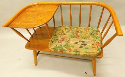 A mid 20thC light coloured ash and elm retro style telephone seat