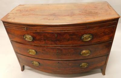 A George III mahogany bow fronted chest of drawers