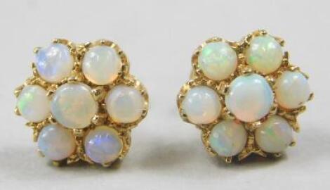 A pair of opal cluster earrings