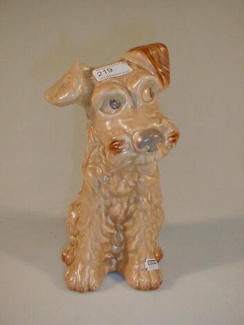 A Sylvac model of a seated terrier in brown glaze