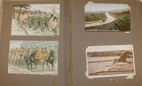 An Edwardian postcard album and a collection of postcards including Harry Payne