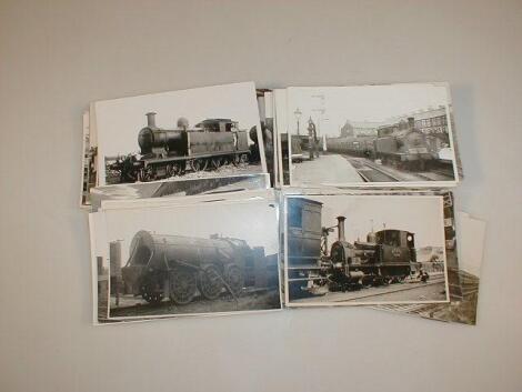 A collection of postcard sized photographs of steam engines and railway related interest