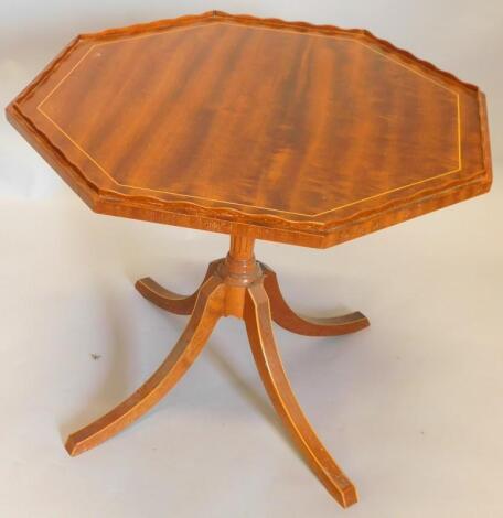 A mahogany occasional table