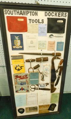 A framed collection of items relating to Southampton dockers tools