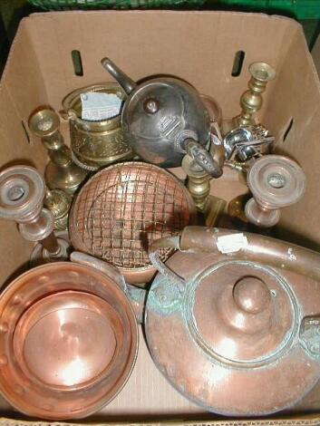 A large copper kettle and a selection of copper and brass