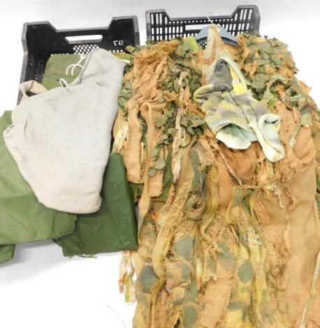 A quantity of army related clothing etc.